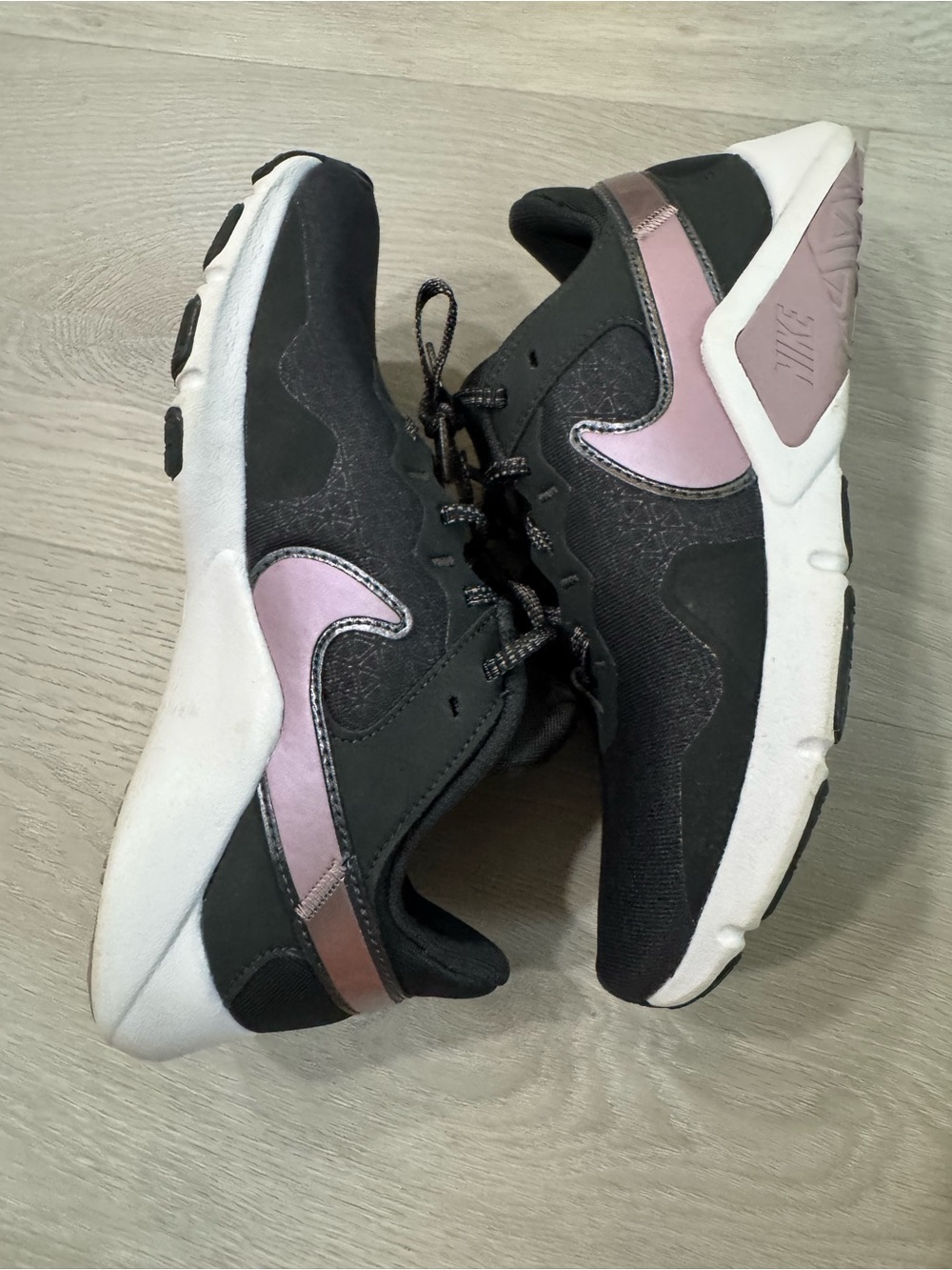 Nike Women's Black Sneakers with light purple Accent